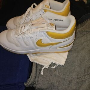 White and Yellow Nike Sneakers